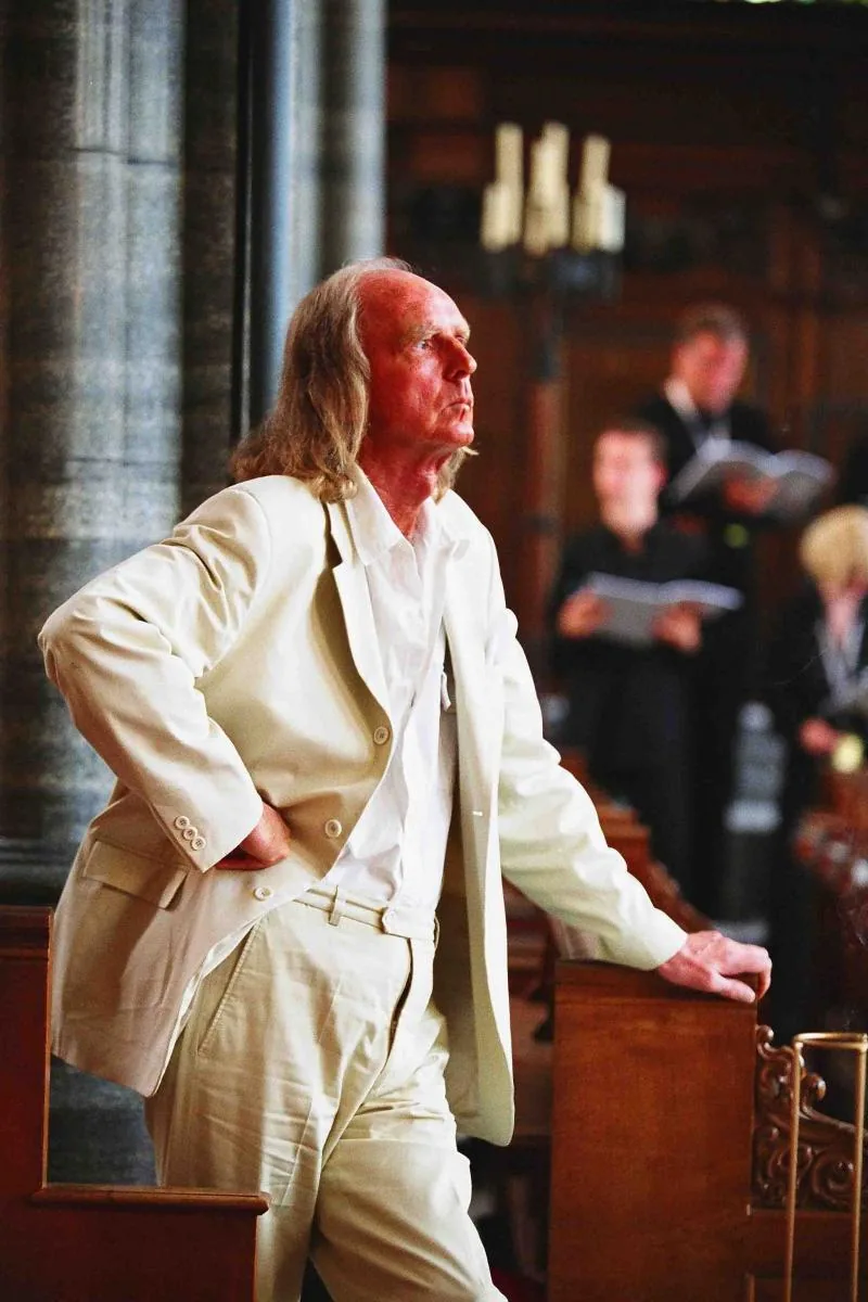 Sir John Tavener in his white suit during rehearsals at the Temple Church. From Stephen Layton's project Sir John Tavener